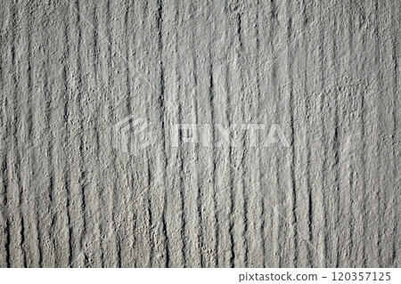 Texture of plaster base layer for decorating. Vertical stripes with groove of pale grayish tint 120357125