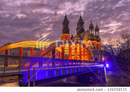 Illuminated Footbridge and Cathedral at Dusk, Poznan, Poland 120358515