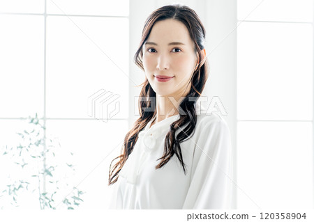 Business image woman looking at camera Business image woman looking at camera 120358904