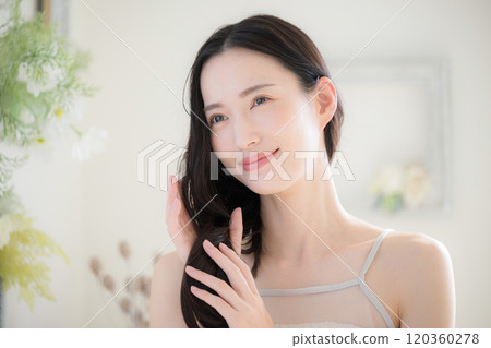 Close-up of botanical image of hair care beauty for young woman's long hair 120360278