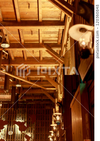 Nostalgic lamp-lit cafe Nostalgic lamp-lit cafe 120360848