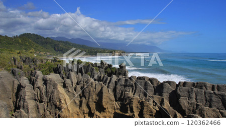Pankake Rocks and beach in Punakaiki, New Zealand. Pankake Rocks and beach in Punakaiki, New Zealand. 120362466