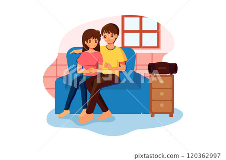 Couple Sitting On Sofa Listening To Music On Wireless Speaker 120362997