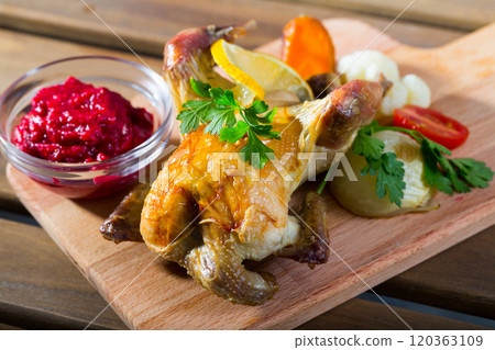 Roasted partridge with cranberry sauce 120363109