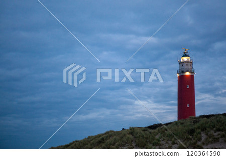 De Cocksdorp, Texel, The Netherlands, October 27th, 2024, Lighthouse Illuminating Coastal Landscape 120364590