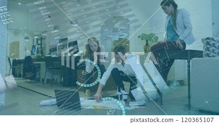 Image of financial data processing over diverse business people in office Image of financial data processing over diverse business people in office 120365107