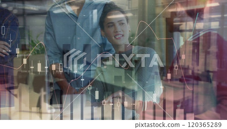 Image of financial data processing over diverse business people in office Image of financial data processing over diverse business people in office 120365289