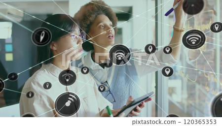 Image of network of connections with wifi icons over diverse business people in office 120365353