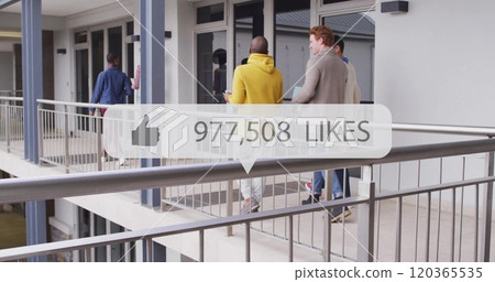 Walking through hallway, people with 606,414 likes image over them 120365535