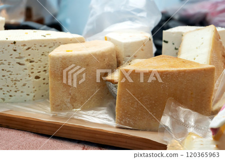 Cheese Wheels for Sale at the Counter Cheese Wheels for Sale at the Counter 120365963