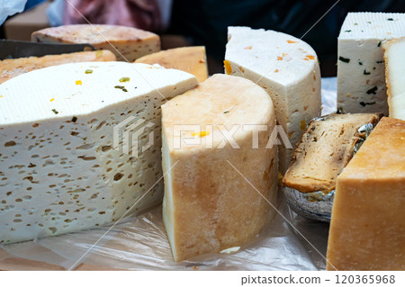 Cheese Wheels for Sale at the Counter Cheese Wheels for Sale at the Counter 120365968