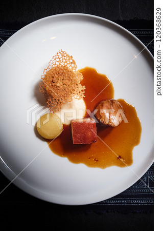 Beautiful and tasty food on a plate, exquisite dish Beautiful and tasty food on a plate, exquisite dish 120368629