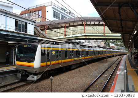 Nambu Line E233 series train departing from Bubaigawara Station 120370988