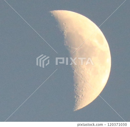 A crescent moon shining in the night, autumn sky 120371030