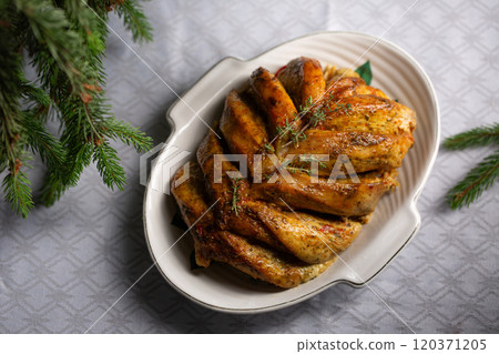 Baked chicken fillet on the bone, an alternative to holiday turkey for the holidays 120371205