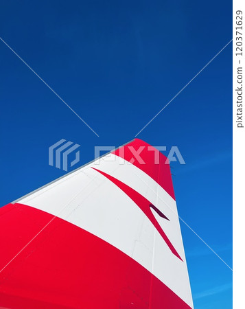 An aircraft on tarmac at Vienna International Airport. 120371629