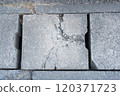 Cracked concrete block 120371723