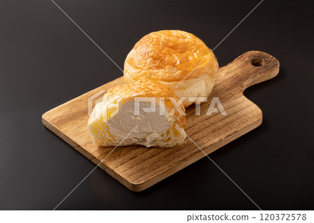 Croissants and cream puffs Croissants and cream puffs 120372578
