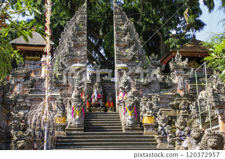 Pura Dalam Ubud with its unique Balinese cracked gates and statues Pura Dalam Ubud with its unique Balinese cracked gates and statues 120372957