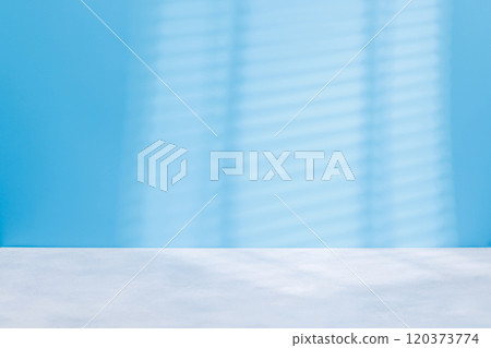 Wooden table and sunlit wall, product template 120373774