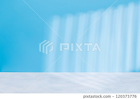 Wooden table and sunlit wall, product template Wooden table and sunlit wall, product template 120373776