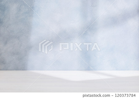 Wooden table and sunlit wall, product template 120373784