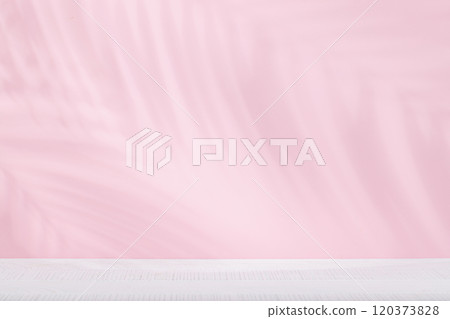 Template with empty table and wall with natural plant shadow and sunny glare Template with empty table and wall with natural plant shadow and sunny glare 120373828