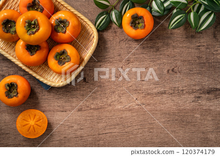 persimmon persimmon sweet fruit fresh ripe top view ripe sweet persimmon あまかき sweet persimmon persimmon persimmon sweet fruit fresh ripe top view ripe sweet persimmon あまかき sweet persimmon 120374179