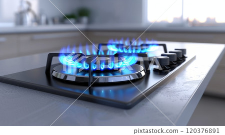 A modern kitchen features a sleek gas stove with blue flames glowing on the burners. Notice the clean countertop and a softly lit background, emphasizing an efficient cooking environment 120376891