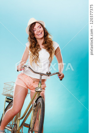 Active woman riding bike bicycle. Recreation. Active woman riding bike bicycle. Recreation. 120377375
