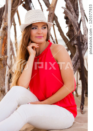 Charming young lady on beach. Charming young lady on beach. 120377933