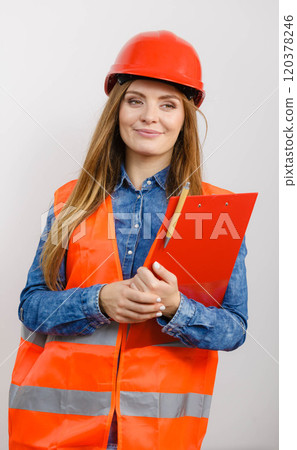 Woman engineer construction builder in helmet. Woman engineer construction builder in helmet. 120378246
