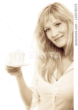 Mature woman drinking tea or coffee.. 120378375