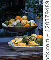 Autmn Gourds And pumpkins decorations in large bowls. 120379489