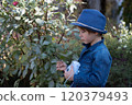 Little boy taking photo in Autumn season. 120379493