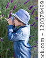 Little boy taking photo in Autumn season. 120379499