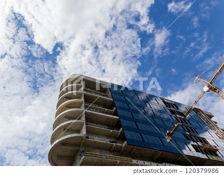 Tower crane near contemporary skyscraper 120379986
