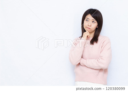 A woman who is seriously worried A woman who is seriously worried 120380099