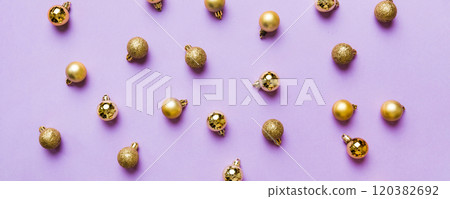 Christmas composition. a pattern of christmas balls on colored background. Flat lay, top view New year decor Christmas composition. a pattern of christmas balls on colored background. Flat lay, top view New year decor 120382692