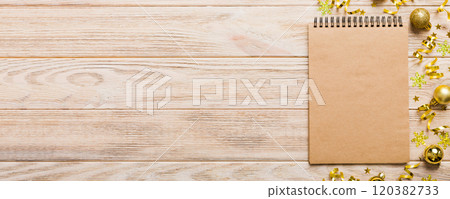 Christmas blank greeting card mock-up scene. Creative layout made of Christmas toy and paper card note. Flat lay. Nature New Year concept Christmas blank greeting card mock-up scene. Creative layout made of Christmas toy and paper card note. Flat lay. Nature New Year concept 120382733