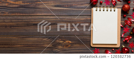 Christmas blank greeting card mock-up scene. Creative layout made of Christmas tree branches and paper card note. Flat lay. Nature New Year concept 120382736
