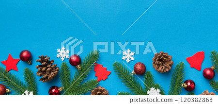 Christmas background with fir branches and Christmas decor. Top view, copy space for text 120382863