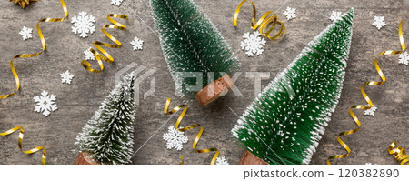 Flat lay composition with christmas trees on color background. Top view with copy space 120382890