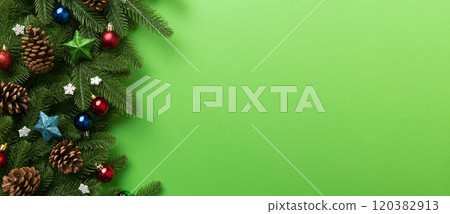 Christmas background with fir branches and Christmas decor. Top view, copy space for text Christmas background with fir branches and Christmas decor. Top view, copy space for text 120382913