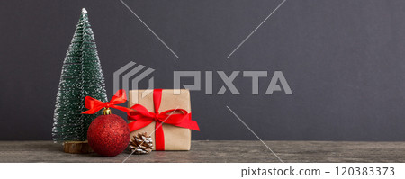 Christmas composition. Gifts, small tree, branches and craft DIY decorations on white background. New year concept. Christmas home decoration Flat lay, top view, copy space Christmas composition. Gifts, small tree, branches and craft DIY decorations on white background. New year concept. Christmas home decoration Flat lay, top view, copy space 120383373
