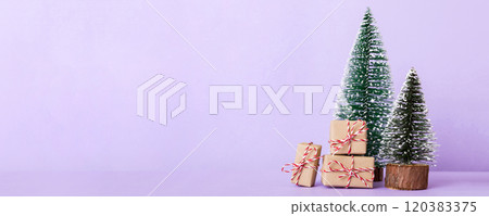 Christmas composition. Gifts, small tree, branches and craft DIY decorations on white background. New year concept. Christmas home decoration Flat lay, top view, copy space 120383375