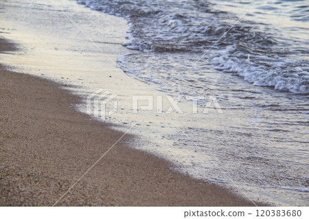 The beach with sea waves running on the sand. Beautiful view on the waves The beach with sea waves running on the sand. Beautiful view on the waves 120383680