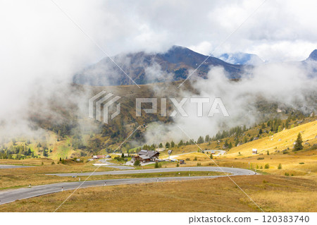 Empty serpentine road Giau pass, Dolomites, Italy Empty serpentine road Giau pass, Dolomites, Italy 120383740