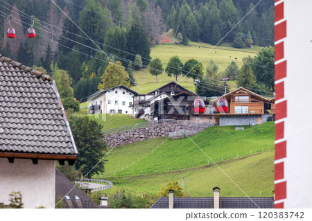 Ortisei, Italy street, Mont Seuc cable car cabins Ortisei, Italy street, Mont Seuc cable car cabins 120383742