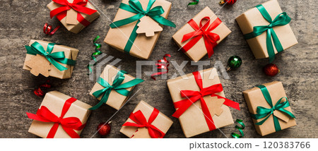 Colored craft gift boxes with colorful ribbons on colored background. Collection of Christmas present boxes 120383766